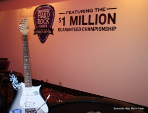 guitar shot with wall logo